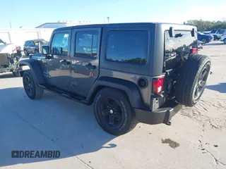 2018 Jeep Wrangler JK Unlimited Sport S with VIN 1C4BJWDG3JL900973, listed as a IAAI auction lot 41239817 with 50,952 mi miles. Bid and sale history available at carsss.com. Image 3.