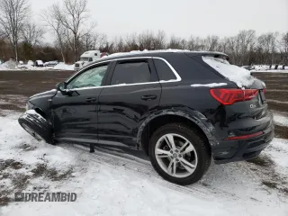 2019 Audi Q3 S line Premium Plus with VIN WA1EECF38K1065065, listed as a Copart auction lot 89388275 with 50,883 mi miles and Salvage Title. Bid and sale history available at carsss.com. Image 2.