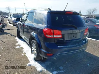 2017 Dodge Journey SXT with VIN 3C4PDCBG7HT533847, listed as a IAAI auction lot 41573777 with 151,578 mi miles and . Bid and sale history available at DreamBid. Image 3.