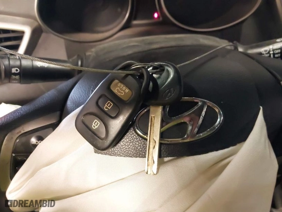 2013 Hyundai Veloster RE:MIX with VIN KMHTC6AD7DU087334, listed as a IAAI auction lot 40162914 with 121,371 mi miles. Bid and sale history available at carsss.com. Image 11.