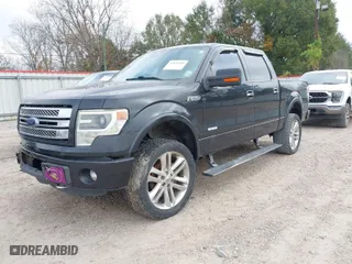 2013 Ford F-150 XL with VIN 1FTFW1ETXDFB95786, listed as a IAAI auction lot 41079449 with 183,002 mi miles. Bid and sale history available at carsss.com. Image 2.