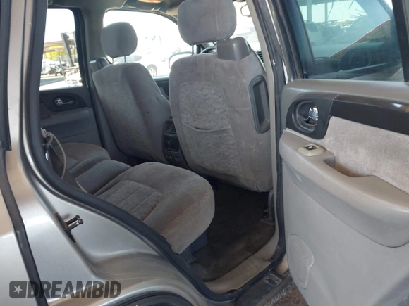 2003 GMC Envoy SLT with VIN 1GKDS13S732346641, listed as a IAAI auction lot 42111222 with 291,231 mi miles and . Bid and sale history available at DreamBid. Image 8.
