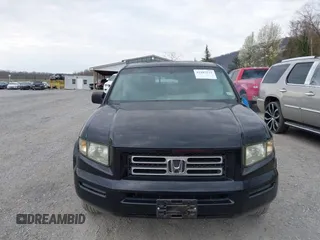 2006 Honda Ridgeline RT with VIN 2HJYK16266H558981, listed as a IAAI auction lot 41887331 with 252,112 mi miles. Bid and sale history available at carsss.com. Image 12.