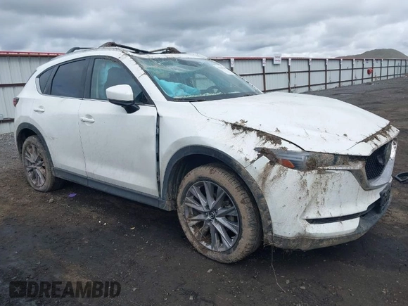 2019 Mazda CX-5 Grand Touring with VIN JM3KFBDM9K0697467, listed as a IAAI auction lot 41940364 with 62,015 mi miles. Bid and sale history available at carsss.com. Image 1.