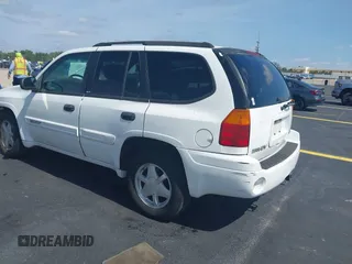 2003 GMC Envoy SLT z VIN 1GKDS13S532221928, wystawiony jako IAAI lot #42211340 z przebiegiem 149 902 mil mil oraz . Historia ofert i sprzedaży dostępna na DreamBid. Obrazek 3.
