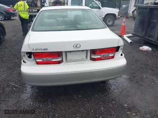 2000 Lexus ES 300 with VIN JT8BF28G3Y0246877, listed as a IAAI auction lot 40365916 with 153,569 mi miles. Bid and sale history available at carsss.com. Image 6.