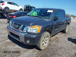 2012 Nissan Titan SV with VIN 1N6AA0EDXCN325756, listed as a IAAI auction lot 42025837 with 218,658 mi miles. Bid and sale history available at carsss.com. Image 2.