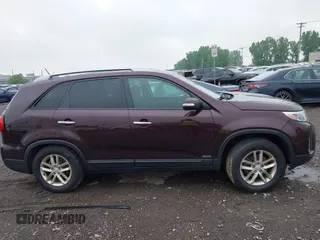 2015 Kia Sorento LX with VIN 5XYKTCA63FG585728, listed as a IAAI auction lot 42424806 with 191,894 mi miles and . Bid and sale history available at DreamBid. Image 14.