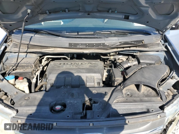 2011 Honda Odyssey EX-L with VIN 5FNRL5H63BB098207, listed as a Copart auction lot 75200284 with 191,504 mi miles and Salvage Title. Bid and sale history available at DreamBid. Image 12.