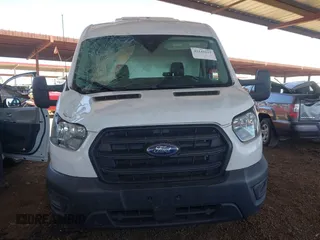 2020 Ford Transit Cargo with VIN 1FTBR1C8XLKB20144, listed as a IAAI auction lot 42141037 with 87,147 mi miles and . Bid and sale history available at carsss.com. Image 12.