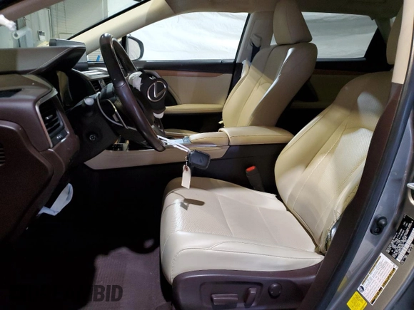 2020 Lexus RX 350L with VIN JTJHZKFA7L2024953, listed as a Copart auction lot 85044234 with 60,874 mi miles and Salvage title. Bid and sale history available at DreamBid. Image 7.
