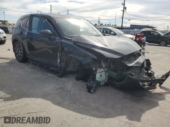 2018 Mazda CX-5 Touring z VIN JM3KFBCM4J0444167, wystawiony jako Copart lot #45900645 z przebiegiem 85 881 mil mil oraz Czysty tytuł • Clean title. Historia ofert i sprzedaży dostępna na DreamBid. Obrazek 4.