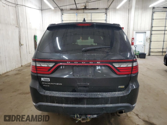2015 Dodge Durango Special Service with VIN 1C4RDJFG2FC193572, listed as a Copart auction lot 48817575 with 210,420 mi miles and Salvage title. Bid and sale history available at DreamBid. Image 6.