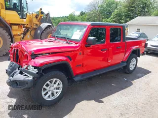 2023 Jeep Gladiator Sport S with VIN 1C6HJTAG8PL572270, listed as a IAAI auction lot 42336294 with 13,865 mi miles and . Bid and sale history available at DreamBid. Image 17.
