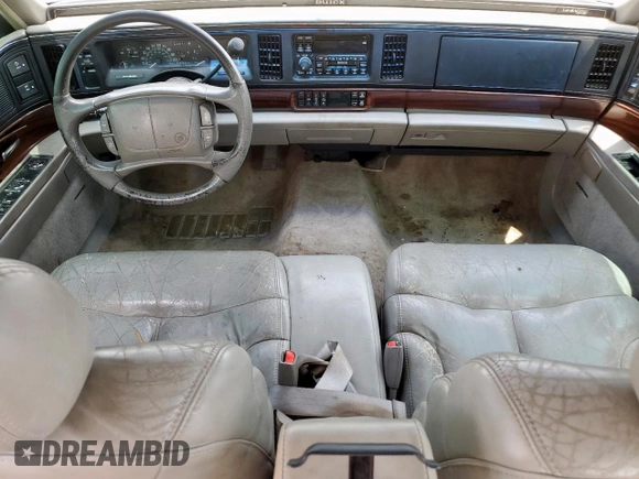 1999 Buick LeSabre Limited z VIN 1G4HR52K5XH469192, wystawiony jako Copart lot #57516205 z przebiegiem 102 413 mil mil oraz Czysty tytuł • Clean title. Historia ofert i sprzedaży dostępna na DreamBid. Obrazek 8.