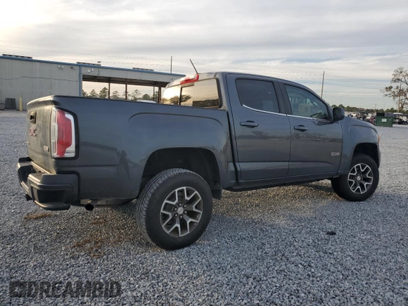 2016 GMC Canyon 4WD SLE with VIN 1GTG6CE35G1370091, listed as a Copart auction lot 87124814 with 130,583 mi miles and Salvage Title. Bid and sale history available at carsss.com. Image 3.