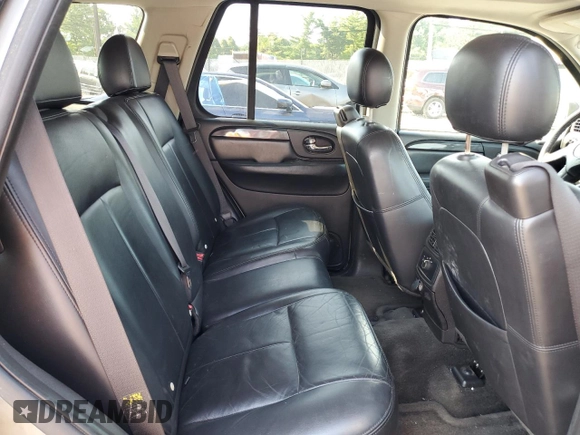 2006 GMC Envoy SLT with VIN 1GKDT13S962305588, listed as a Copart auction lot 69196964 with 118,289 mi miles and Salvage Title. Bid and sale history available at DreamBid. Image 11.