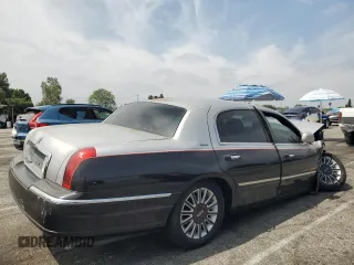 2003 Lincoln Town Car Executive z VIN 1LNHM81W33Y653643, wystawiony jako Copart lot #58824145 z przebiegiem Nie podano mil oraz Szkoda całkowita • Salvage title. Historia ofert i sprzedaży dostępna na DreamBid. Obrazek 3.