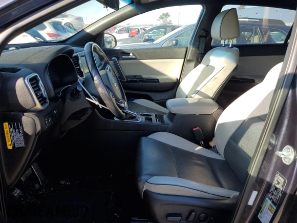 2019 Kia Sportage EX z VIN KNDPNCAC6K7564952, wystawiony jako Copart lot #87963465 z przebiegiem 35 228 mil mil oraz Szkoda całkowita • Salvage title. Historia ofert i sprzedaży dostępna na DreamBid. Obrazek 7.