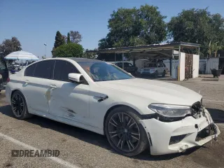 2019 BMW M5 z VIN WBSJF0C53KB284878, wystawiony jako Copart lot #59773965 z przebiegiem Nie podano mil oraz Szkoda całkowita • Salvage title. Historia ofert i sprzedaży dostępna na DreamBid. Obrazek 4.