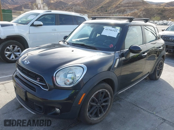 2015 MINI Countryman S with VIN WMWZC3C55FWT04354, listed as a IAAI auction lot 41346143 with Not provided miles and . Bid and sale history available at DreamBid. Image 2.
