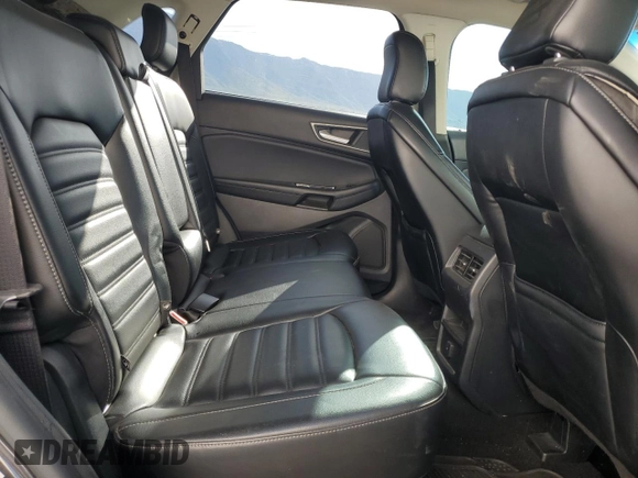 2020 Ford Edge SEL z VIN 2FMPK4J97LBA46310, wystawiony jako Copart lot #56177805 z przebiegiem 97 180 mil mil oraz Szkoda całkowita • Salvage title. Historia ofert i sprzedaży dostępna na DreamBid. Obrazek 11.
