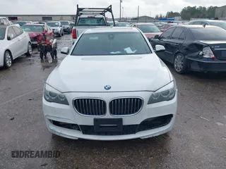 2015 BMW 7 Series 740Li with VIN WBAYE4C54FD947205, listed as a IAAI auction lot 41566291 with 172,729 mi miles and . Bid and sale history available at DreamBid. Image 12.