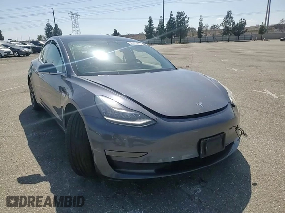 2020 Tesla Model 3 Standard Range Plus z VIN 5YJ3E1EA5LF644296, wystawiony jako Copart lot #56953645 z przebiegiem 89 356 mil mil oraz Szkoda całkowita • Salvage title. Historia ofert i sprzedaży dostępna na DreamBid. Obrazek 13.