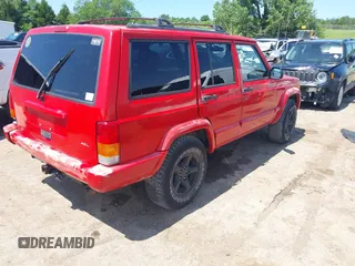 1999 Jeep Cherokee Sport with VIN 1J4FT68S1XL504294, listed as a IAAI auction lot 42509063 with 225,661 mi miles and . Bid and sale history available at DreamBid. Image 4.