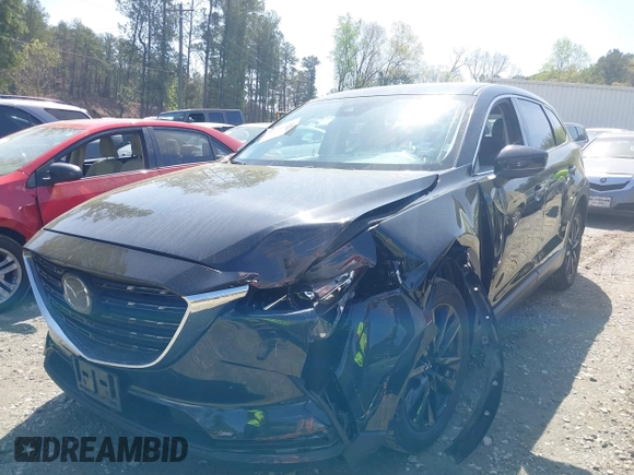 2023 Mazda CX-9 Touring Plus with VIN JM3TCBAY9P0657854, listed as a IAAI auction lot 41931409 with 54,036 mi miles and . Bid and sale history available at DreamBid. Image 17.