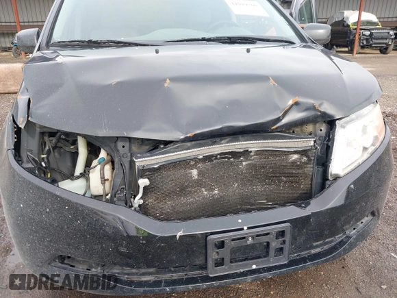 2012 Honda Odyssey EX with VIN 5FNRL5H46CB096547, listed as a IAAI auction lot 41919700 with 165,882 mi miles and . Bid and sale history available at carsss.com. Image 6.