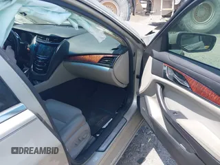2014 Cadillac CTS Luxury RWD z VIN 1G6AR5SX4E0141195, wystawiony jako IAAI lot #42144565 z przebiegiem 80 267 mil mil oraz . Historia ofert i sprzedaży dostępna na DreamBid. Obrazek 5.