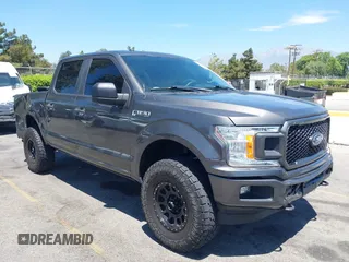 2018 Ford F-150 XL with VIN 1FTEW1EP2JKE71489, listed as a IAAI auction lot 42690928 with 93,696 mi miles and . Bid and sale history available at DreamBid. Image 1.