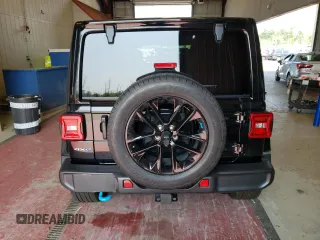 2023 Jeep Wrangler Sahara with VIN 1C4JJXP65PW627241, listed as a Copart auction lot 62873313 with 9,219 mi miles and Clean Title. Bid and sale history available at DreamBid. Image 6.