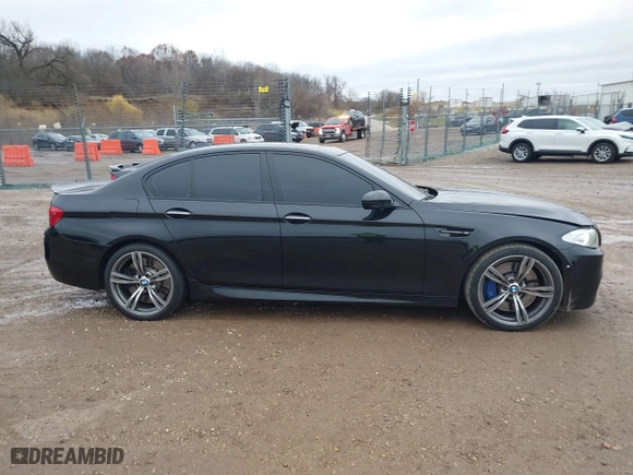 2013 BMW M5 with VIN WBSFV9C51DD095750, listed as a IAAI auction lot 40907304 with 93,014 mi miles. Bid and sale history available at carsss.com. Image 13.