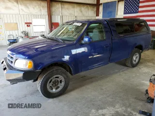 1997 Ford F-150 with VIN 1FTDF18W0VLB11829, listed as a Copart auction lot 69103414 with 291,277 mi miles and Clean title. Bid and sale history available at DreamBid. Image 1.