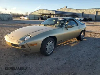 1984 Porsche 928 z VIN WP0JB092XES862382, wystawiony jako Copart lot #79716354 z przebiegiem 117 599 mil mil oraz Szkody całkowita. Historia ofert i sprzedaży dostępna na DreamBid. Obrazek 1.