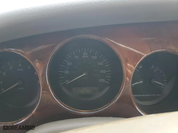 1997 Jaguar XK8 with VIN SAJGX2748VC001869, listed as a Copart auction lot 75406464 with 0 mi miles and Salvage Title. Bid and sale history available at carsss.com. Image 9.