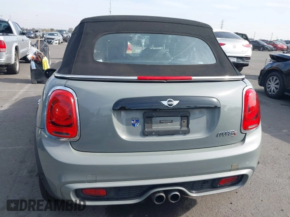 2017 MINI Convertible Cooper S z VIN WMWWG9C36H3C81439, wystawiony jako IAAI lot #41480915 z przebiegiem 64 104 mil mil oraz . Historia ofert i sprzedaży dostępna na DreamBid. Obrazek 17.
