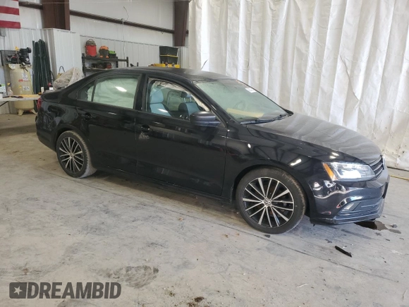 2015 Volkswagen Jetta Sport with VIN 3VWD17AJ5FM348751, listed as a Copart auction lot 42027295 with 91,739 mi miles and Salvage title. Bid and sale history available at DreamBid. Image 4.