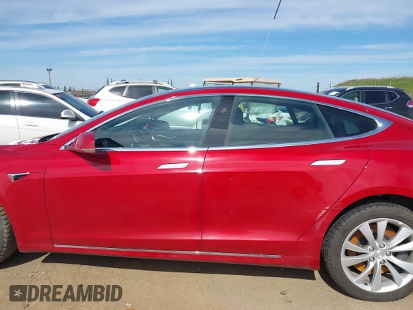 2018 Tesla Model S 75D with VIN 5YJSA1E26JF259651, listed as a IAAI auction lot 41690804 with Not Provided miles and . Bid and sale history available at DreamBid. Image 14.