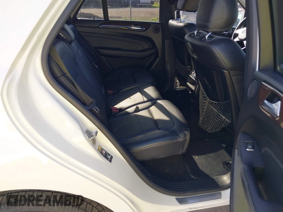 2013 Mercedes-Benz M 350 z VIN 4JGDA5JB2DA143975, wystawiony jako IAAI lot #42247490 z przebiegiem 114 899 mil mil oraz . Historia ofert i sprzedaży dostępna na DreamBid. Obrazek 8.