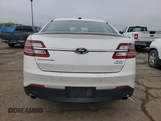 2015 Ford Taurus SEL z VIN 1FAHP2E89FG100466, wystawiony jako Copart lot #56887395 z przebiegiem 109 233 mil mil oraz Szkoda całkowita • Salvage title. Historia ofert i sprzedaży dostępna na DreamBid. Obrazek 6.