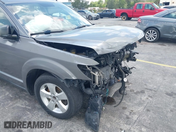 2013 Dodge Journey SE with VIN 3C4PDCAB3DT626929, listed as a IAAI auction lot 42318702 with Not provided miles and . Bid and sale history available at DreamBid. Image 12.
