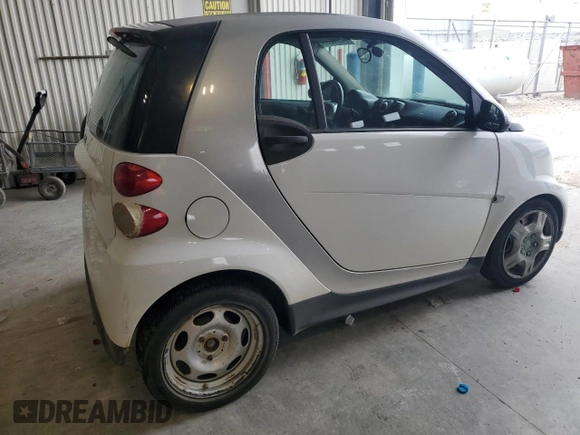 2013 Smart fortwo Pure с VIN WMEEJ3BA9DK626037, выставлен на аукционе Copart как лот 54573255 с пробегом 66 070 миль миль и Чистый • Clean title. История ставок и продаж доступна на DreamBid. Изображение 3.