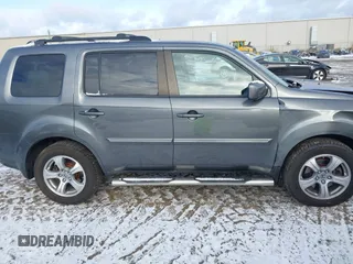 2012 Honda Pilot EX-L with VIN 5FNYF4H52CB013539, listed as a IAAI auction lot 40987268 with 93,022 mi miles and . Bid and sale history available at DreamBid. Image 13.