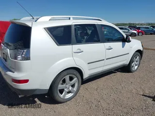 2007 Mitsubishi Outlander XLS z VIN JA4MT41X27Z020276, wystawiony jako IAAI lot #42348742 z przebiegiem 75 715 mil mil oraz . Historia ofert i sprzedaży dostępna na DreamBid. Obrazek 4.