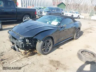 2021 Ford Mustang EcoBoost with VIN 1FATP8UH9M5103925, listed as a IAAI auction lot 41658685 with 76,869 mi miles. Bid and sale history available at carsss.com. Image 2.