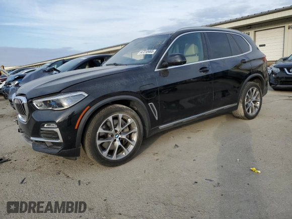 2021 BMW X5 xDrive45e with VIN 5UXTA6C07M9E59778, listed as a Copart auction lot 47310465 with 70,149 mi miles and Salvage Title. Bid and sale history available at carsss.com. Image 1.