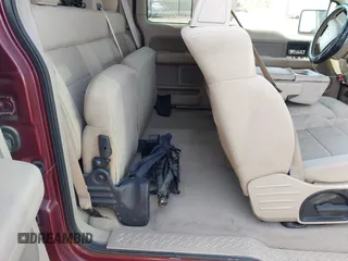 2005 Ford F-150 XLT with VIN 1FTPX12505FB69853, listed as a IAAI auction lot 42092756 with 330,699 mi miles. Bid and sale history available at carsss.com. Image 8.